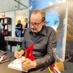 Jean-Christophe Chauzy lors de la Foire du livre de Bruxelles 2024 (crédit photo : Damien Canteau / Comixtrip)