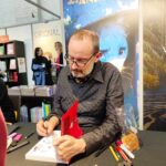 Jean-Christophe Chauzy lors de la Foire du livre de Bruxelles 2024 (crédit photo : Damien Canteau / Comixtrip)