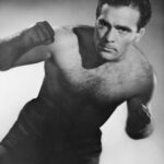 Le boxeur français Marcel Cerdan photographié par le studio Harcourt en 1946 (crédit : domaine public / wiki comons)